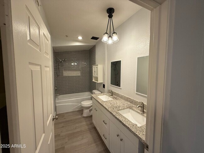 Building Photo - 9555 E Raintree Dr