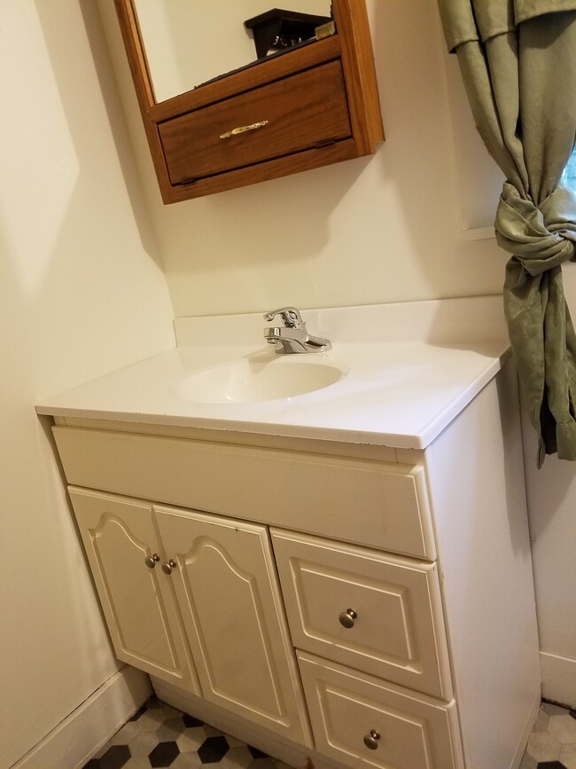 Bathroom, vanity and medicine cabinet. - 15 Goodrich St