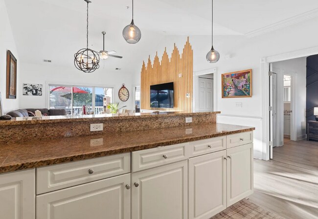 Building Photo - Stunning Top-Floor 2-Bedroom Retreat with Serene Pond Views!