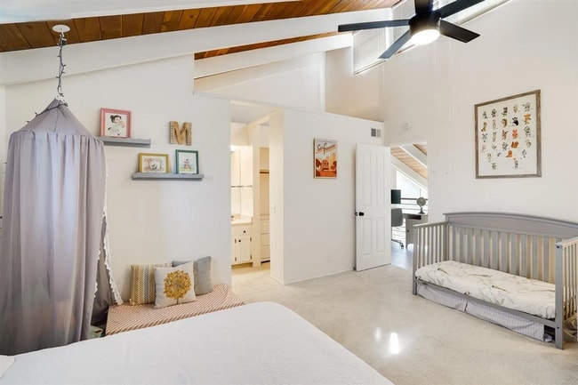 Building Photo - Spacious 1,550 Sq Ft Townhome | 2-Car Garage & High Ceilings w/ Exposed Beams