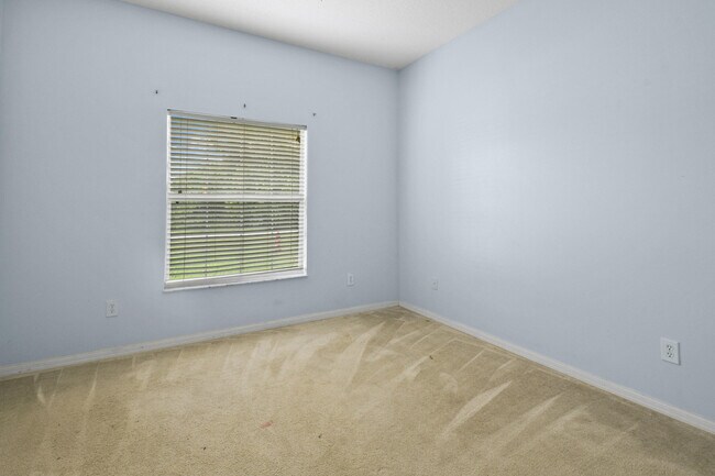Building Photo - 6221 NW Hacienda Ln