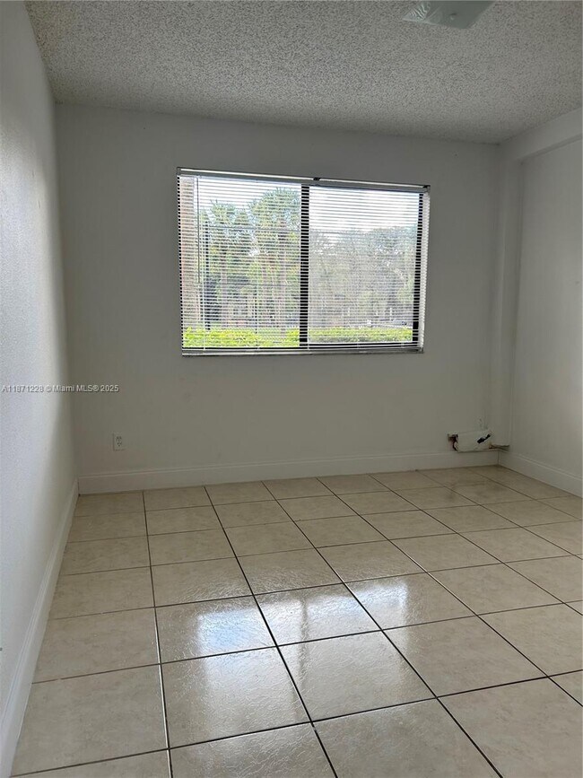 Building Photo - 9088 W Atlantic Blvd