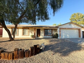 Building Photo - "Charming 3-Bedroom Oasis in Goodyear - Sp...