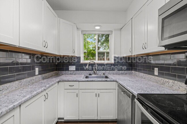 Building Photo - 7876 Big Bend Blvd