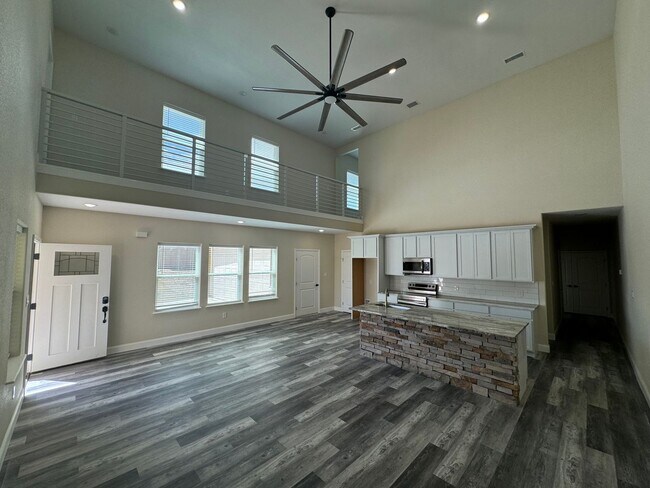 Building Photo - COMING SOON.....Modern Townhome with private fenced yard! HIGH CEILINGS PETS WELCOME