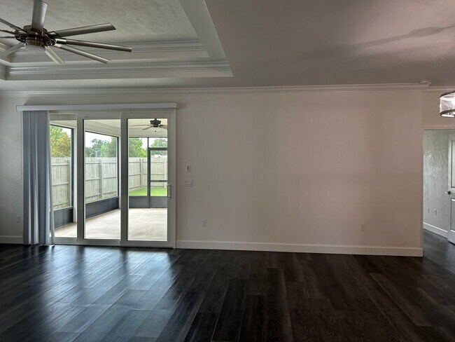 Building Photo - Immaculate 3/2 with Yard, Garage, and Pet ...