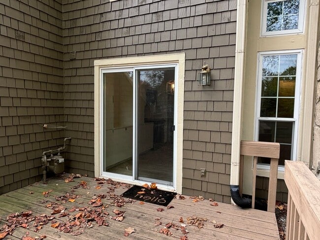 Building Photo - Charming Condo in a Can't-Miss Location – Private Deck, Garage, and Nature-Filled Community