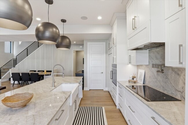 Building Photo - Modern 5-Bed Home in Atlas Waterfront — Elevator, Luxury Finishes & Prime Location