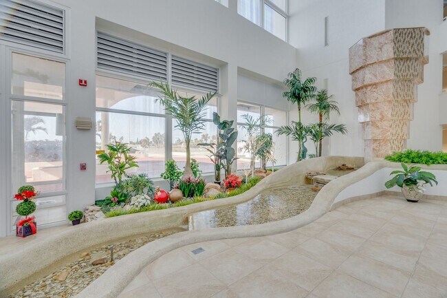 Building Photo - Direct Oceanfront Furnished Condo with Bre...