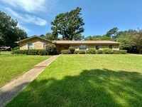 Building Photo - Spacious 4-Bedroom Home on a Corner Lot wi...
