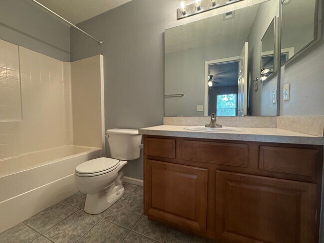 Building Photo - Available Now! Westside Timothy's Landing 2/2.5 Townhome with a 1-Car Garage