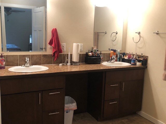 Master bath dual sinks. - 1220 W Bismark Ave