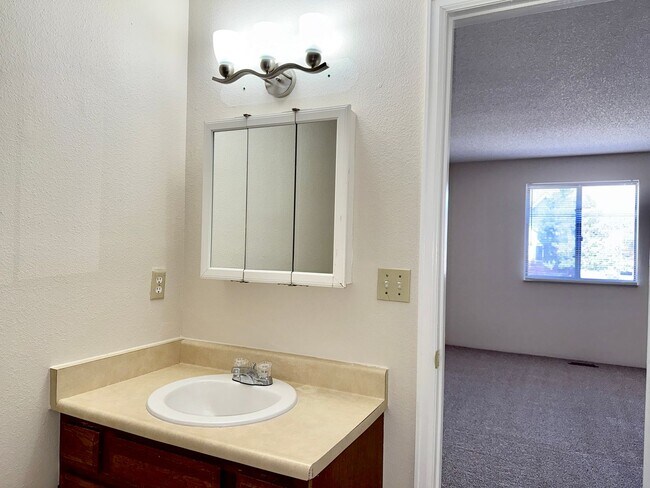 Building Photo - Updated Two Bed Townhome Nestled in the He...