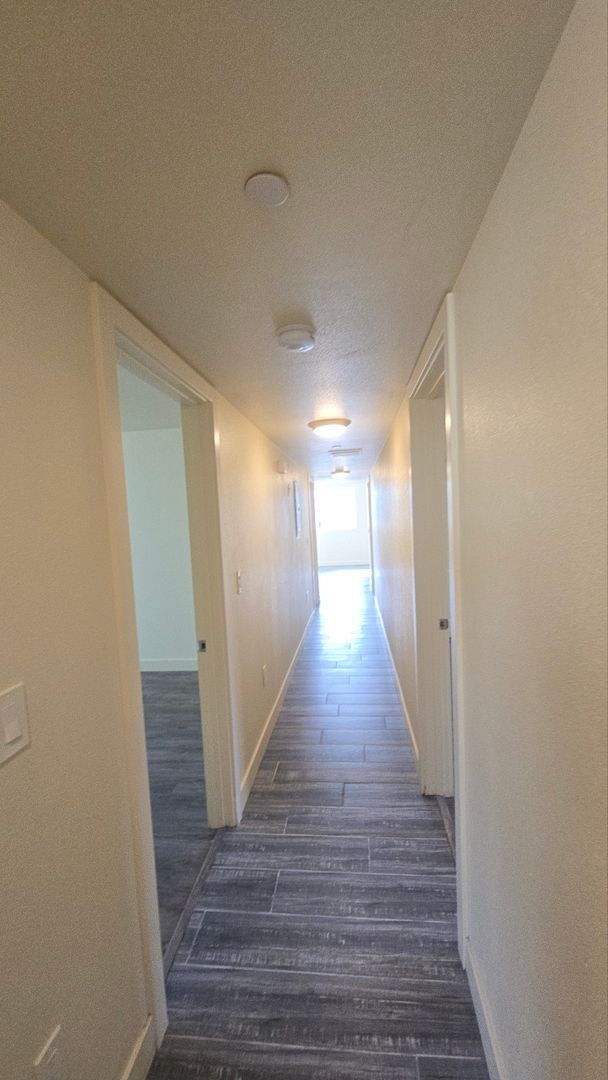 Building Photo - All Bed& Bath at 1st ,2 car Assigned Parking Space at back with access alley,tile &laminate floor...