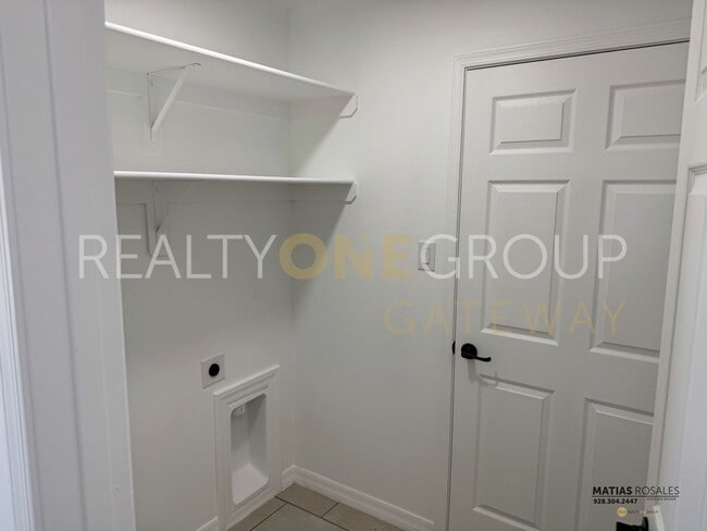 Building Photo - Three Bedroom Two Bath Home with All Tile ...