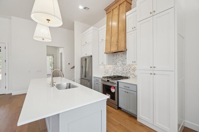 Building Photo - Classic Cape Cod Meets Modern Glam: Your D...