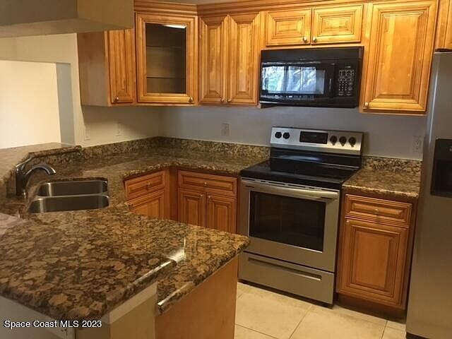 Building Photo - 7667 N Wickham Rd