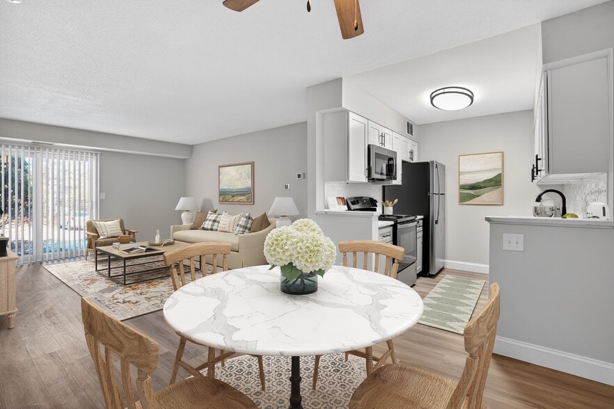 Welcome to Bay Ridge at Nashua Apartments, where modern comfort meets inviting spaces. Enjoy a stylish kitchen, cozy living area, and elegant dining setup perfect for gatherings. Schedule a tour today and envision your new home! - Bay Ridge at Nashua Apartments