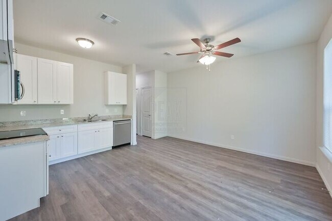 Building Photo - $1,475! Stylish 2BR Townhome with 15 Minutes from Fort Worth Stockyards! 100% off your first full...