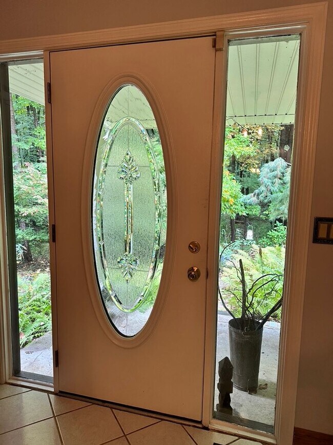 Building Photo - Dream Home in Highland, Michigan: Your Private Oasis on 5 Wooded Acres