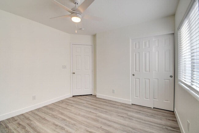 Building Photo - Great home with 4 bedrooms, 2.5 baths. New Floors Paint and Countertops.