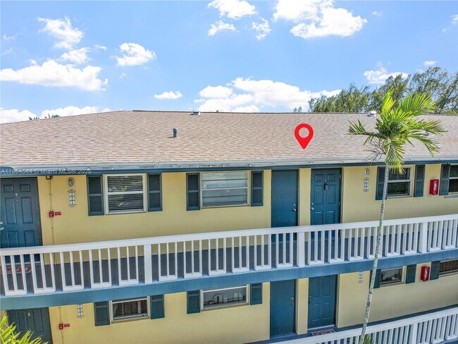 Building Photo - 1400 NE 57th Ct