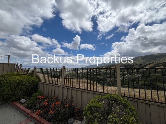 Building Photo - Great two-level home in Las Palmas II with scenic views