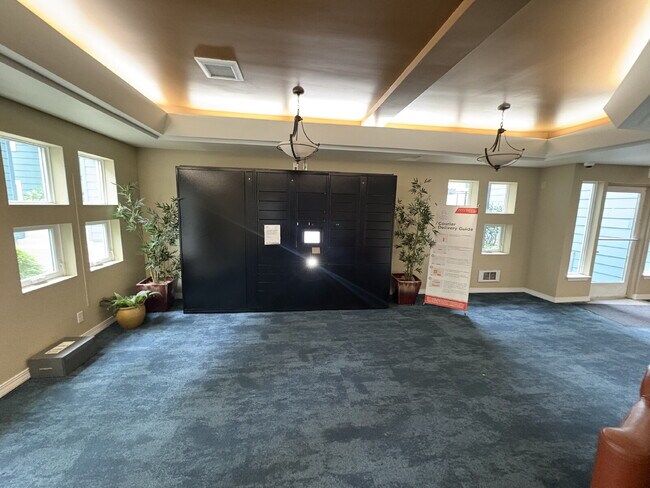Building Photo - Bright, Modern 1BR Near Hospitals, SU & Transit in secure building with garage parking and a Walk...