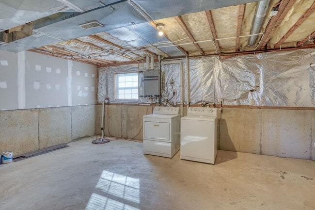 Building Photo - New, New, New - Spacious 3 Bedroom Townhouse with a Finished Basement !!