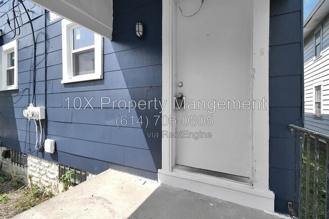 Building Photo - 1311 E 24th Ave