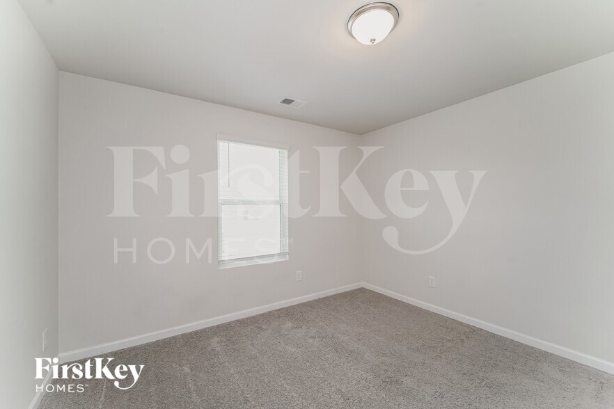 Building Photo - 10714 Rivergate Dr NW