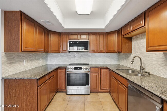 Building Photo - 7940 E Camelback Rd
