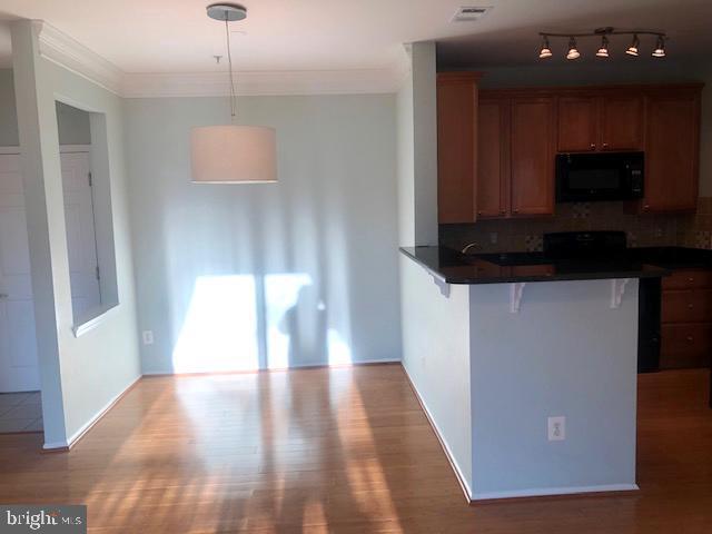 Building Photo - 1601 Spring Gate Dr.