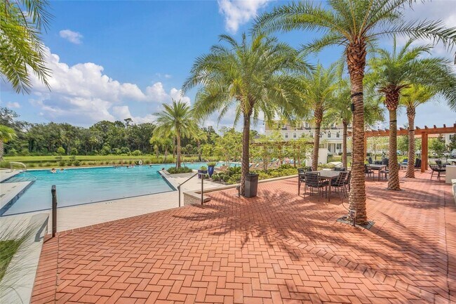 Building Photo - Brand new construction 3 Bedroom Town Home in Island Village of Celebration