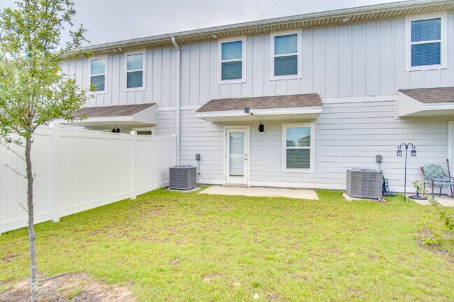 Building Photo - Gulf Breeze 3BR/2.5BA New Construction Townhome - Special: ½ Off Deposit for Active-Duty Military!