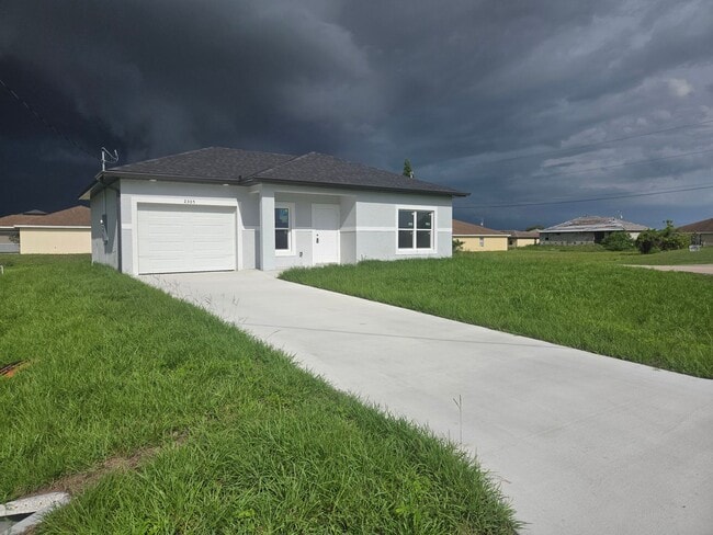 Building Photo - BRAND NEW 2/2/1- SW LEHIGH ACRES