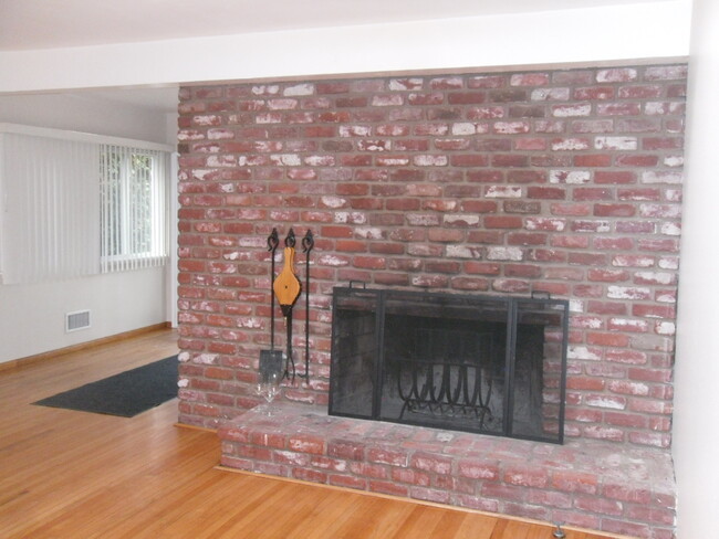 Living Room Wood Burning Fire Place - 2300 Oak Ave