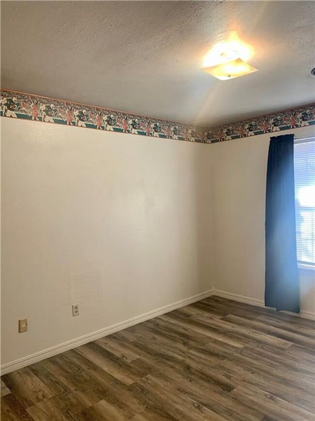 Building Photo - Charming Home with Open Kitchen, Fireplace & 2-Car Garage