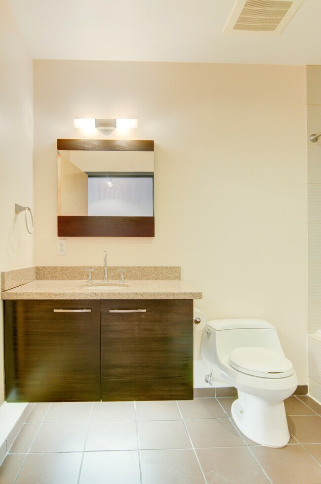 Building Photo - Luxury Gold Lofts! Bright Open Floor Plan with City Views-Secure Parking