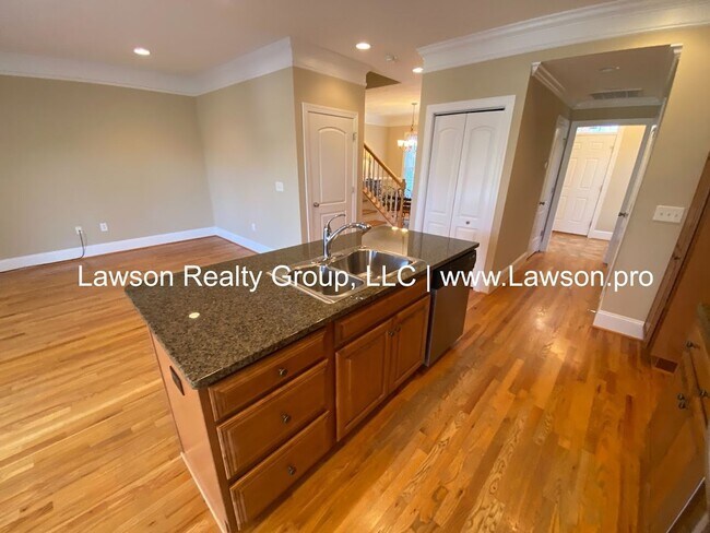 Building Photo - Colonial Green Row Home with Two Car Garage