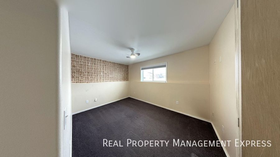 Building Photo - Spacious 4BR, 2BA Gem with Fireplace and Open Basement