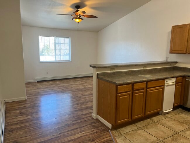 Kitchen opens to living room - 492 Coronado Way