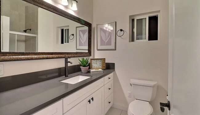 Building Photo - Now Leasing: Modern Arcadia Home – 4 Beds, 4 Baths, Premium Kitchenaid Kitchen, Three-Car Garage ...