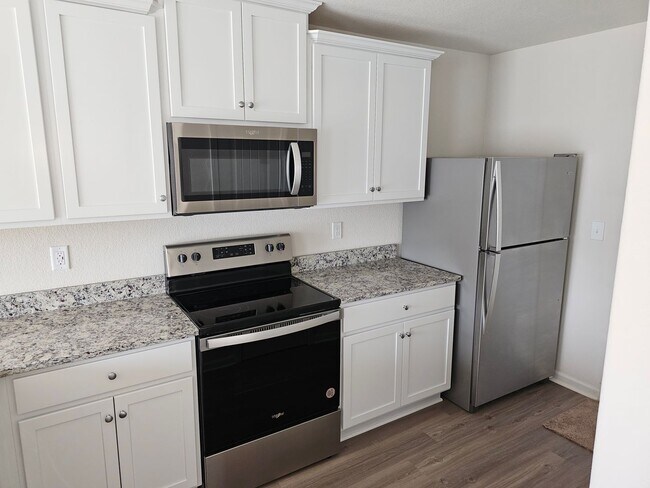 Building Photo - Brand New 3BR Home Minutes from the Airport