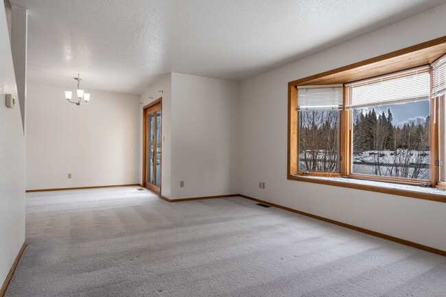 Building Photo - Right on the river! 2 Bedroom, 1.5 Bath, W/Garage, Duplex!