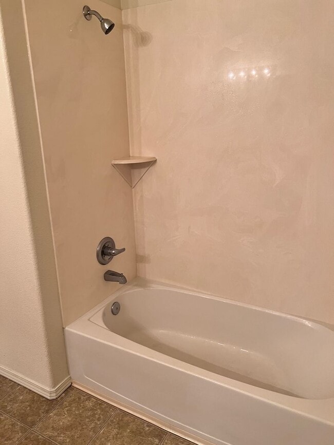 Building Photo - Wonderful 3 Br condo in gated community with the major appliances and 1 car garage.