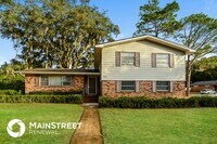 Building Photo - 5563 Primrose Ln