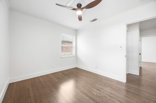 Building Photo - **$40K+ IN UPGRADES AND A FENCED BACKYARD WITH TWO STORAGE BUILDINGS**