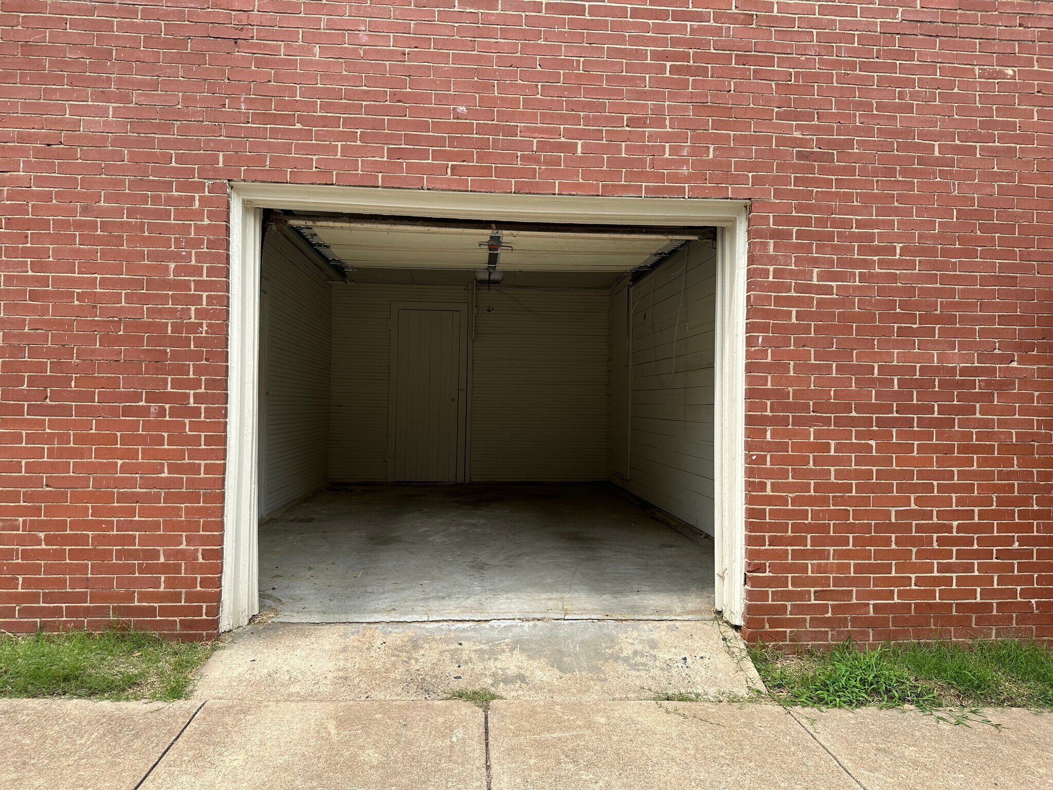 Unit comes with one bay garage with storage closet. - 314 E 7th St