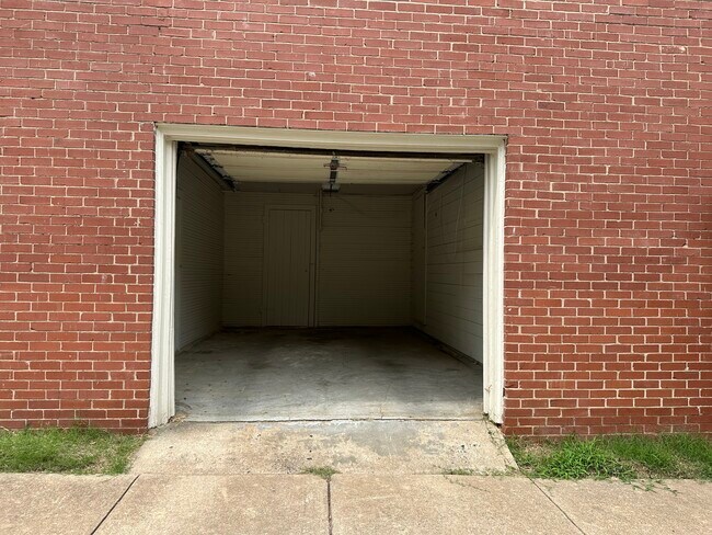 Unit comes with one bay garage with storage closet. - 314 E 7th St